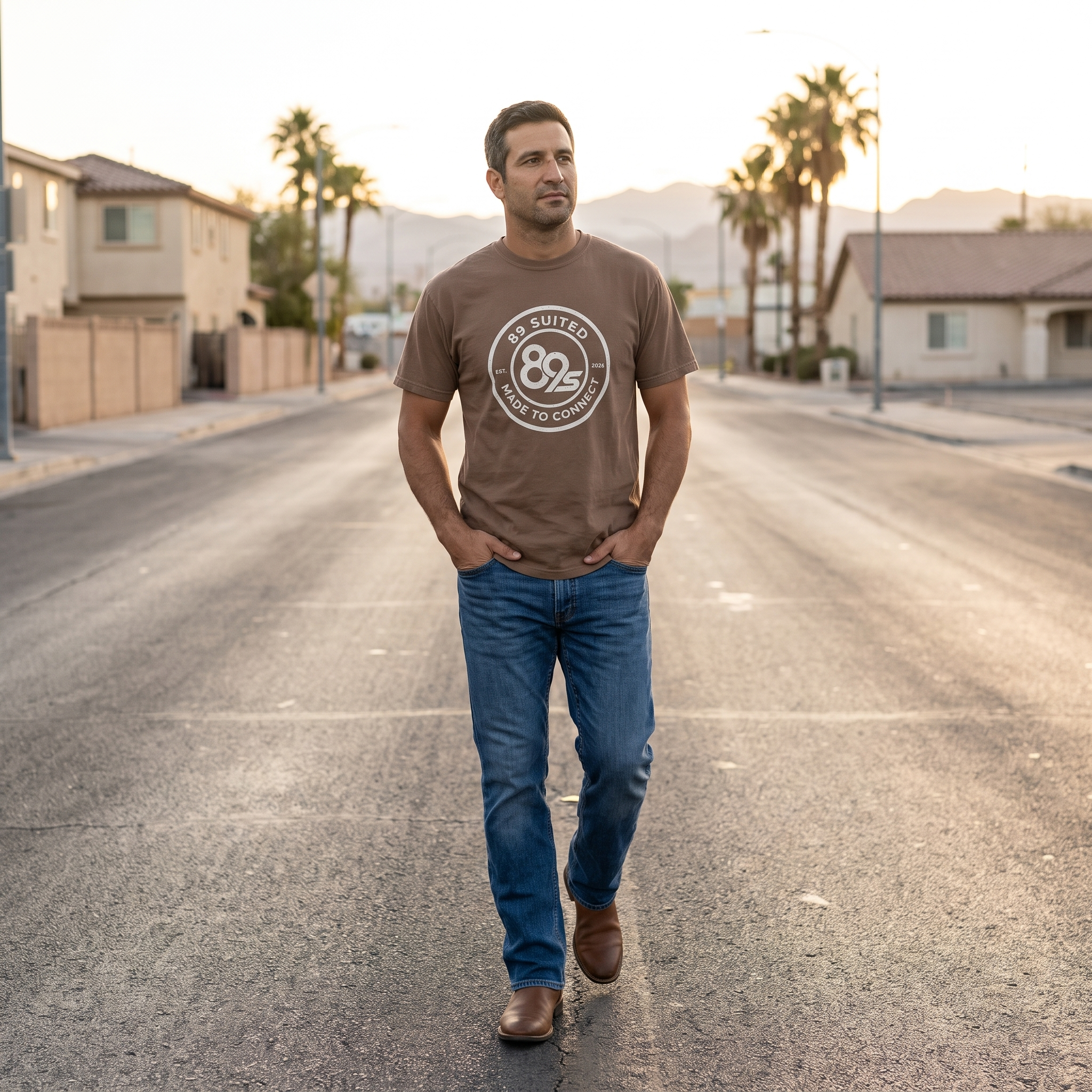 A poker player wearing the 89 Suited tee on an empty Las Vegas street at dawn
