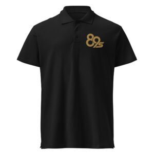 The 89s Polo in black, with the 89 Suited print on the chest.